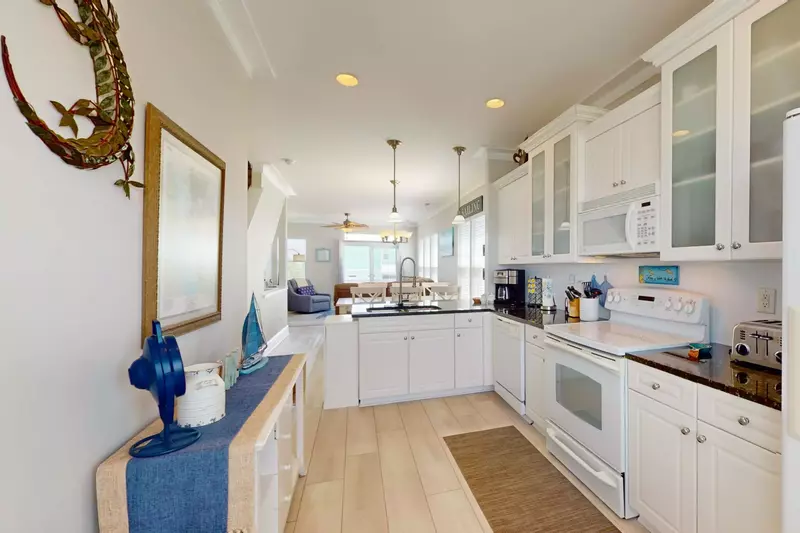 Open concept kitchen, dining and living room