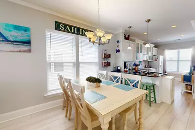 Seating for 6 at the dining table plus additional counter seating