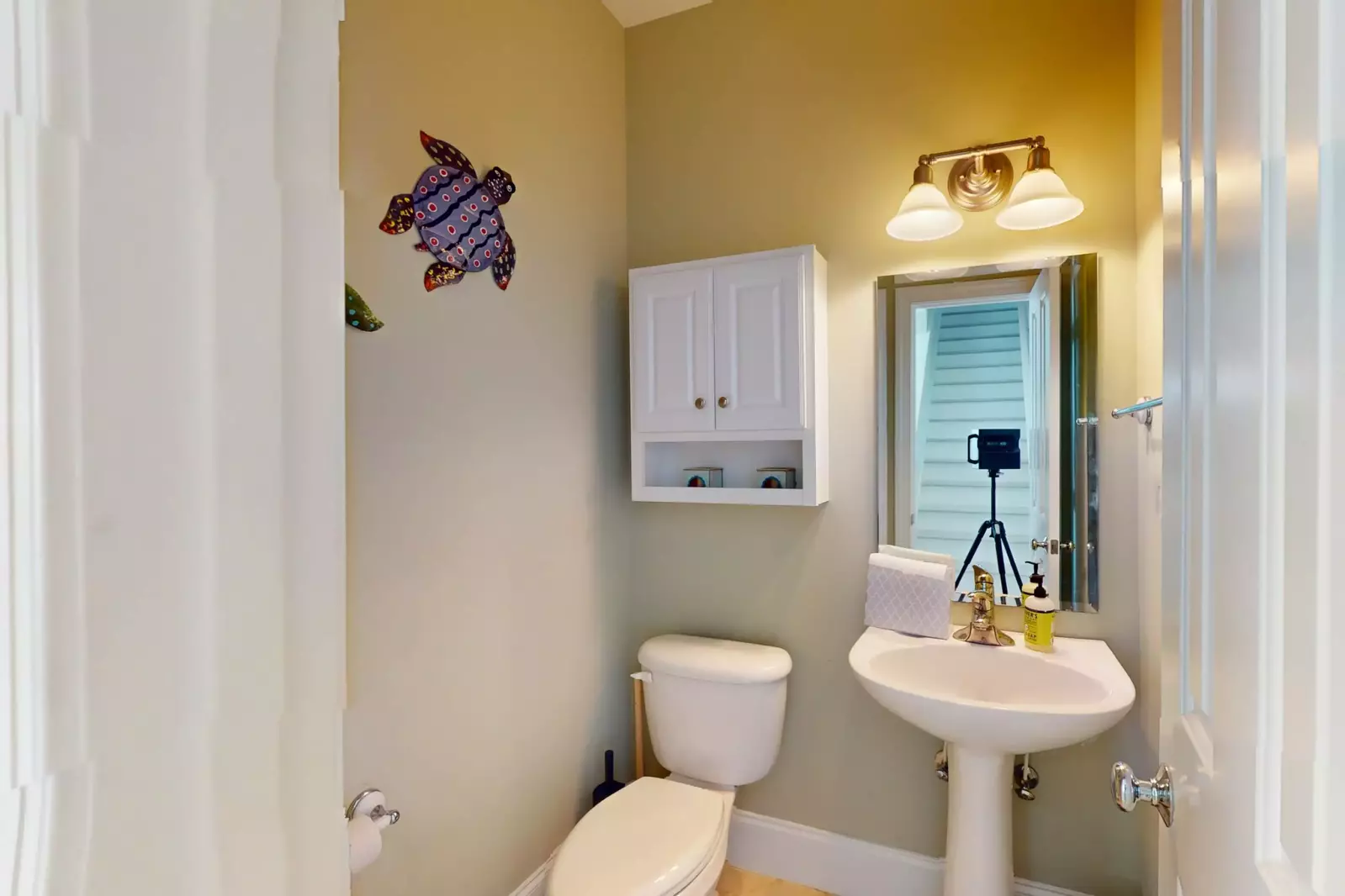 Half bathroom convenient to living, dining and kitchen