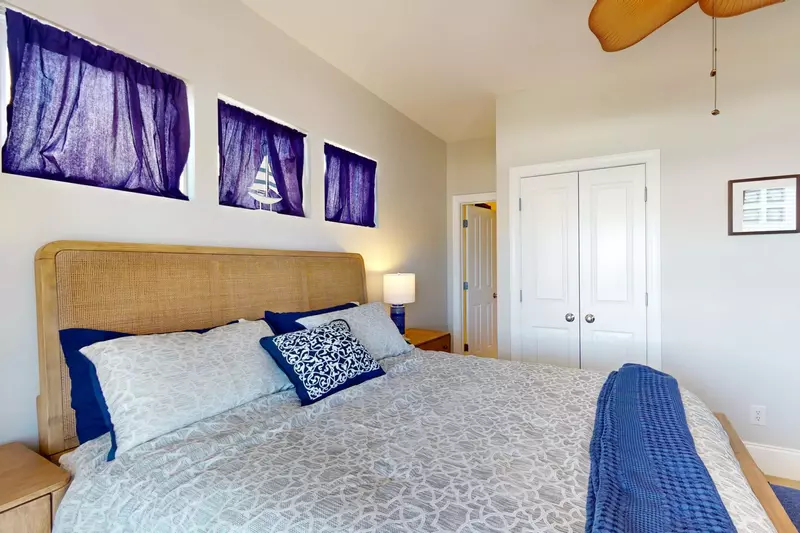 Owner suite with private deck access and ensuite full bathroom