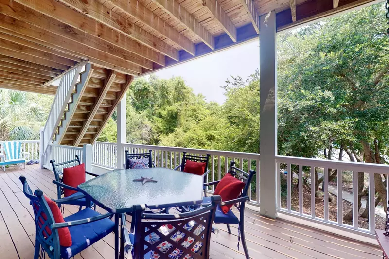 The trees surrounding the home provide plenty of privacy and tranquility while hanging out on the large deck.