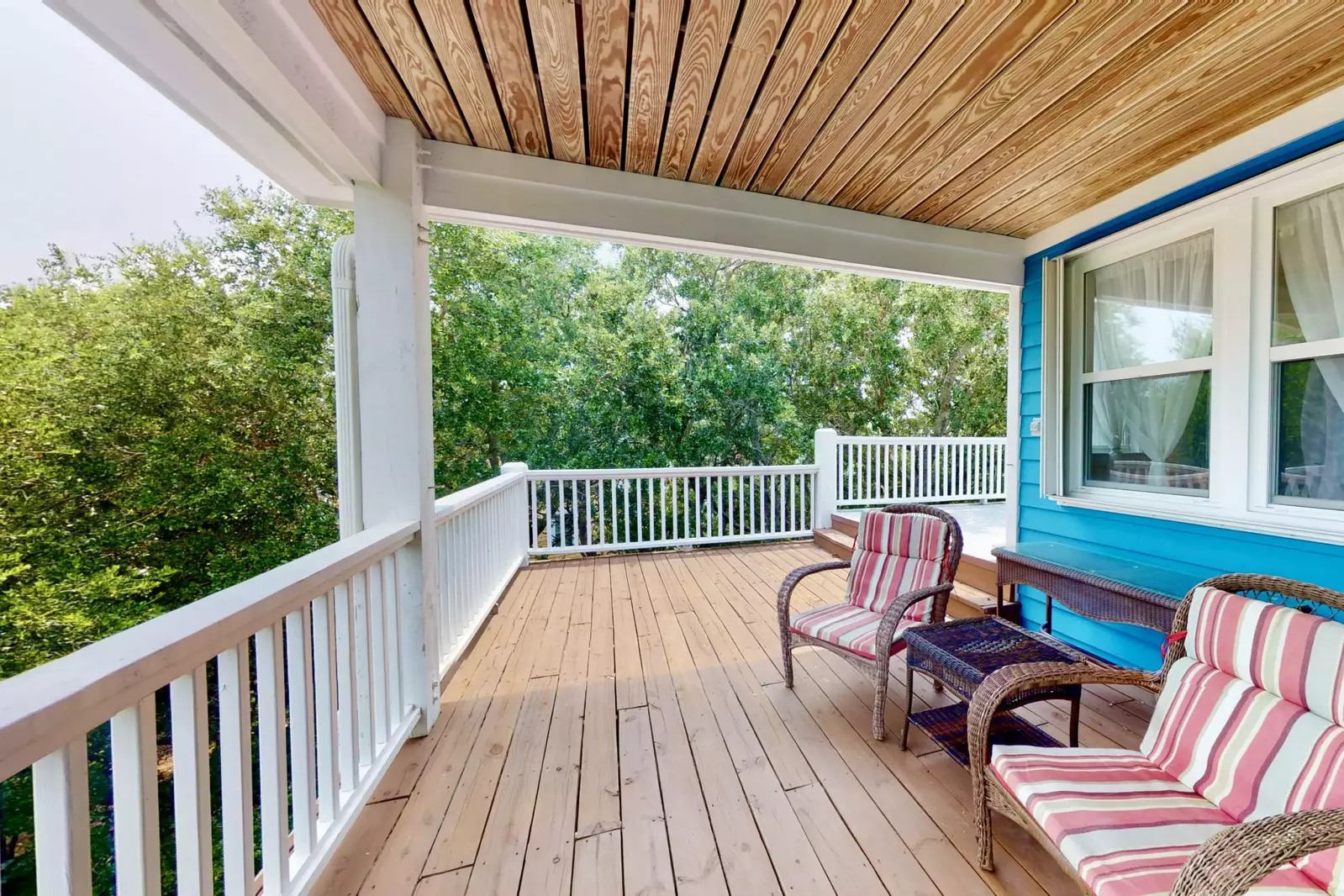 Relax on the 3rd floor deck with your loved one after a day of fun