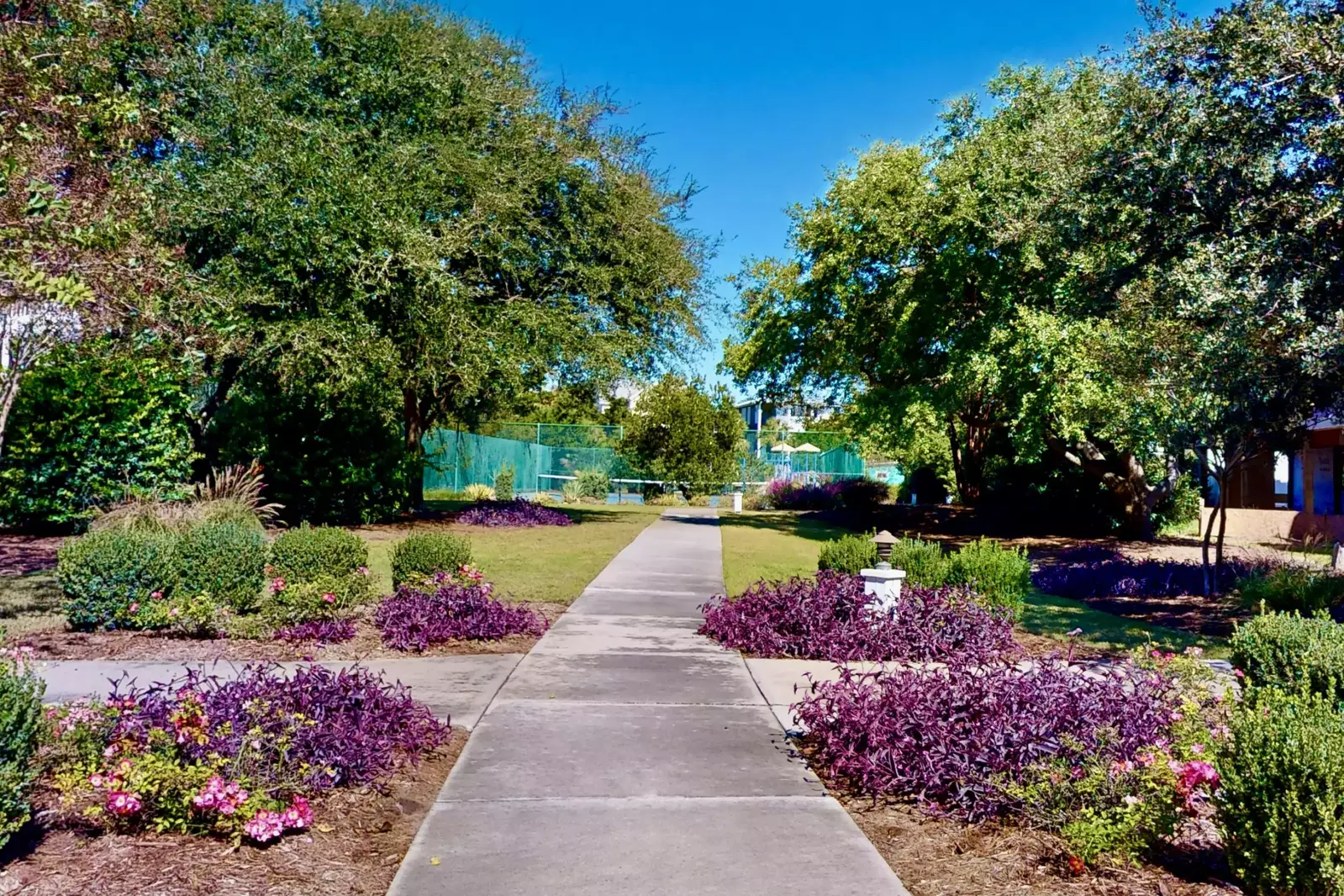 There is a convenient path behind the home that takes you right to the community pool/clubhouse/tennis court