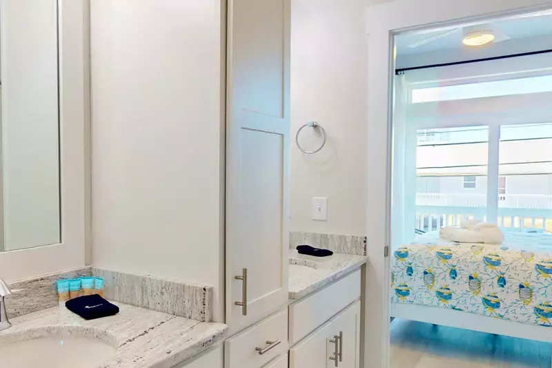 Jack and jill bathroom shared between a queen bedroom and the bunk bedroom