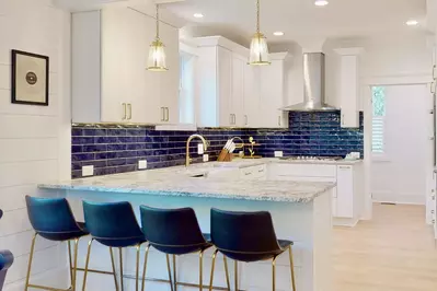 Enjoy a casual meal with comfortable seating at the kitchen island