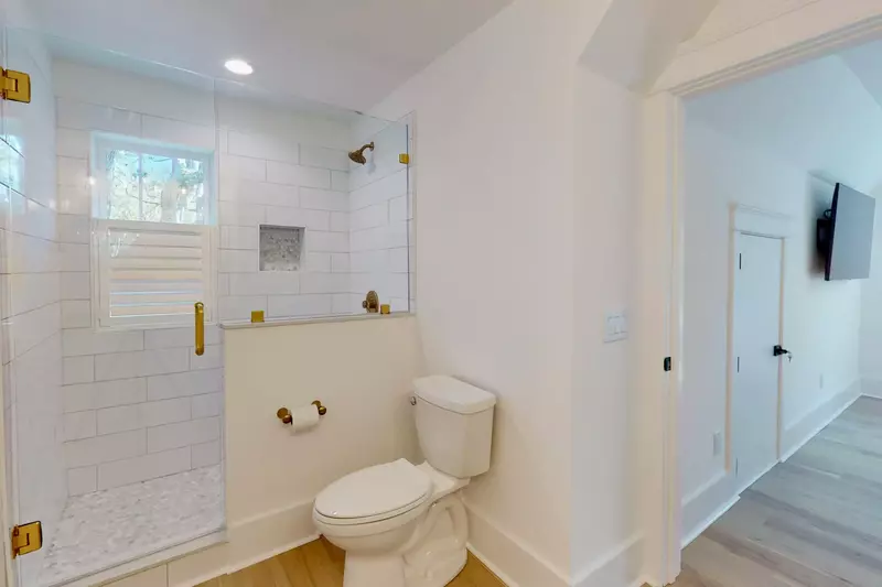 Third owner suite has a large, private full bathroom with a walk in shower