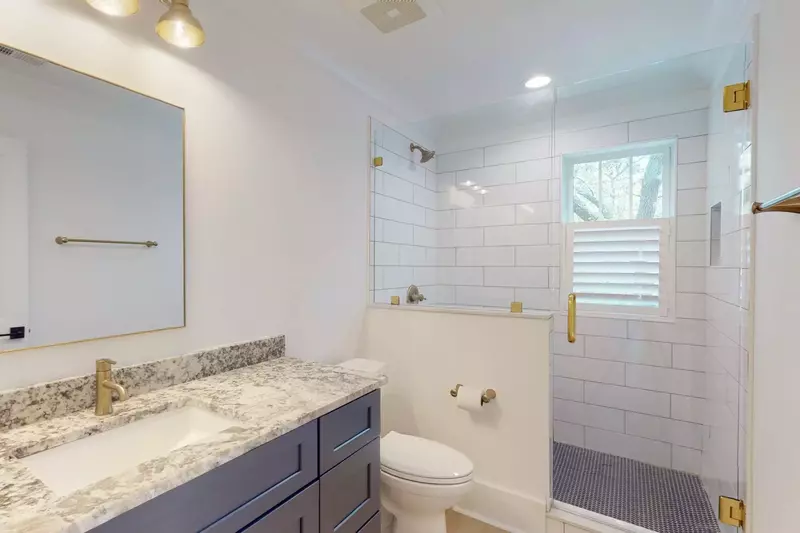 The 2nd floor full hall bath is very convenient to the bunk room