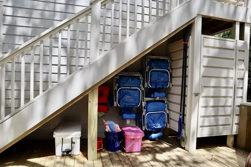 Outdoor shower, beach chairs, paddles, life jackets, coolers and beach toys are all available to guests