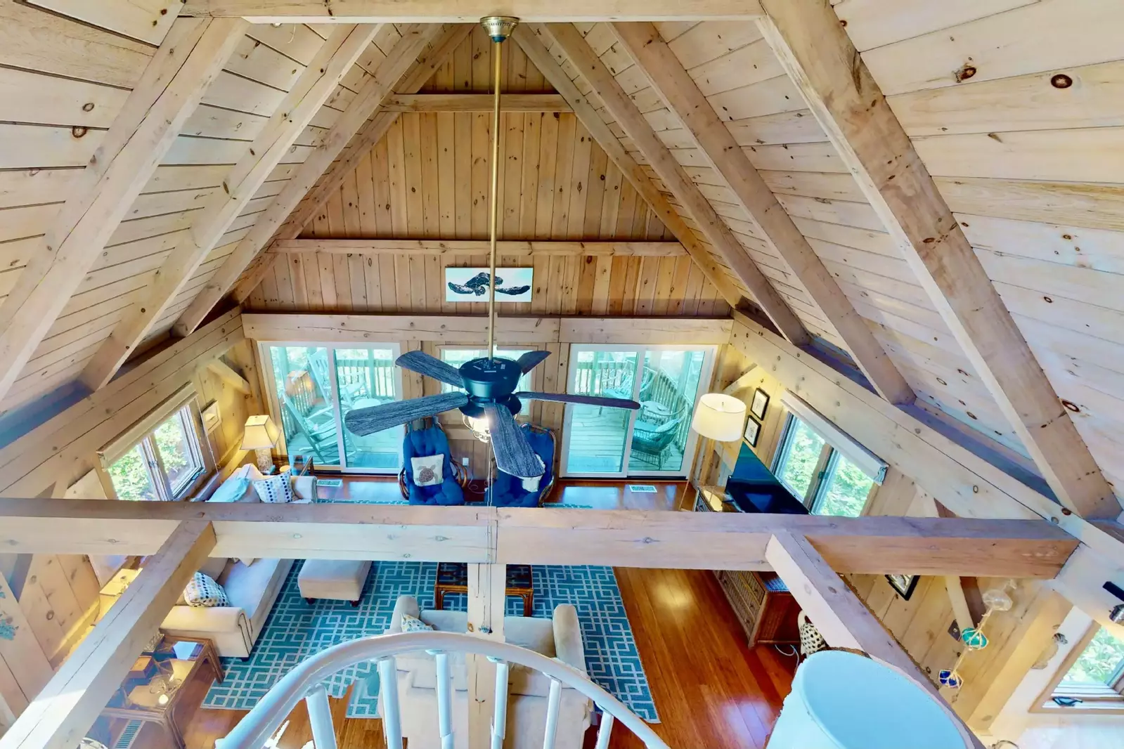 The loft overlooks the living and dining room area