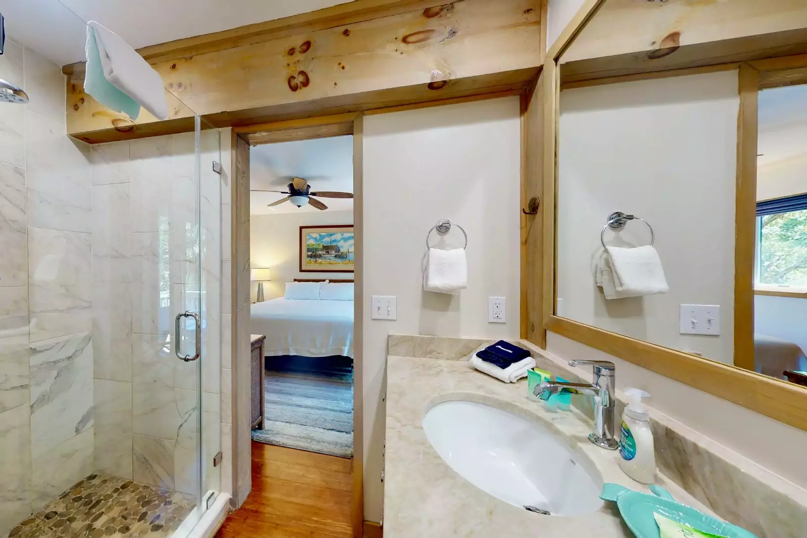 Owner suite full bathroom with new glass enclosure walk-in shower