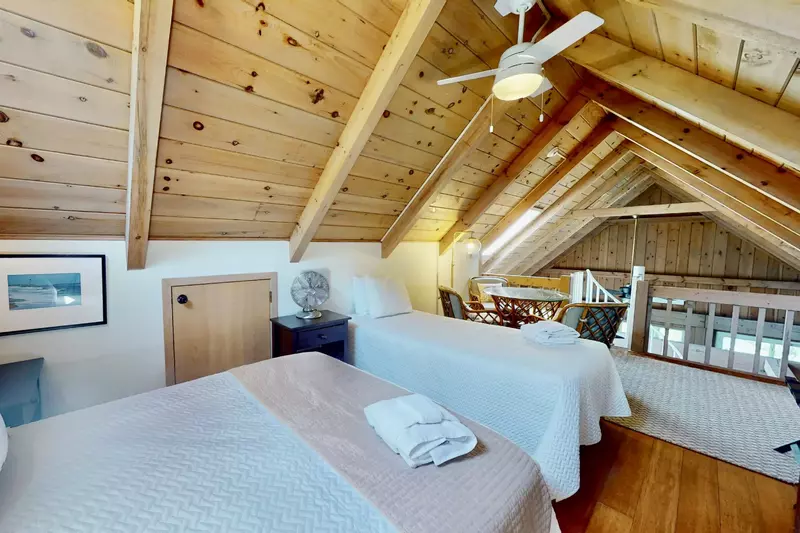 Adorable loft area with a full and a twin bed