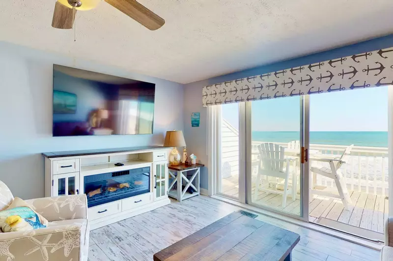 The living area has a large Smart TV for watching that big game or your favorite movie