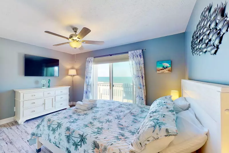 Ocean views, large TV, private full bathroom, direct access to the deck.  The owner suite has it all!
