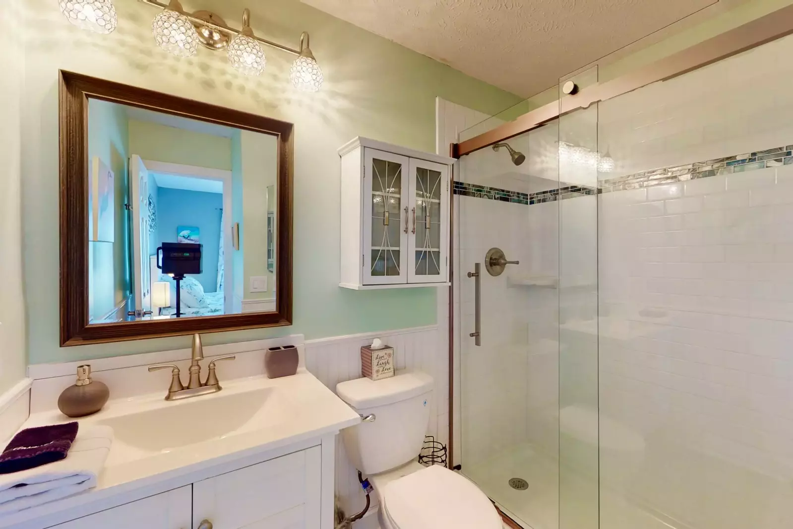 The owner suite bathroom has been completely updated with a large walk in shower