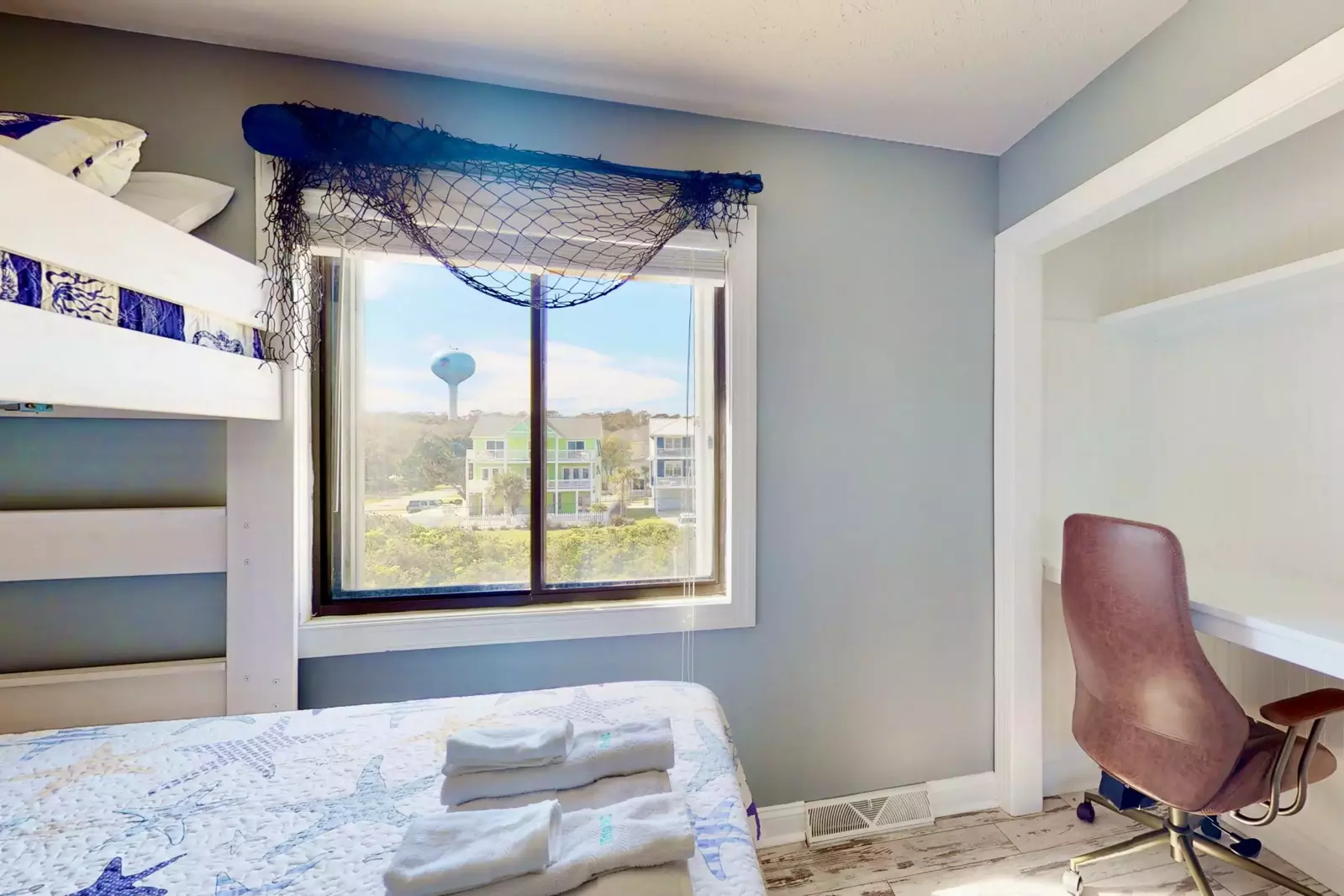 There is a large working area you can use as a desk with a comfy chair in the bunk room