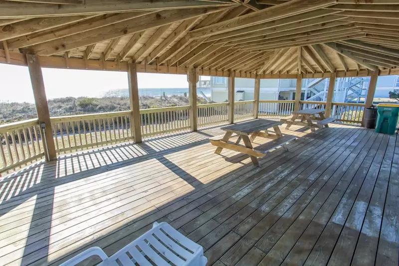 Just off one of the outdoor pool areas, there is plenty of room for a picnic in this spacious gazebo overlooking the ocean