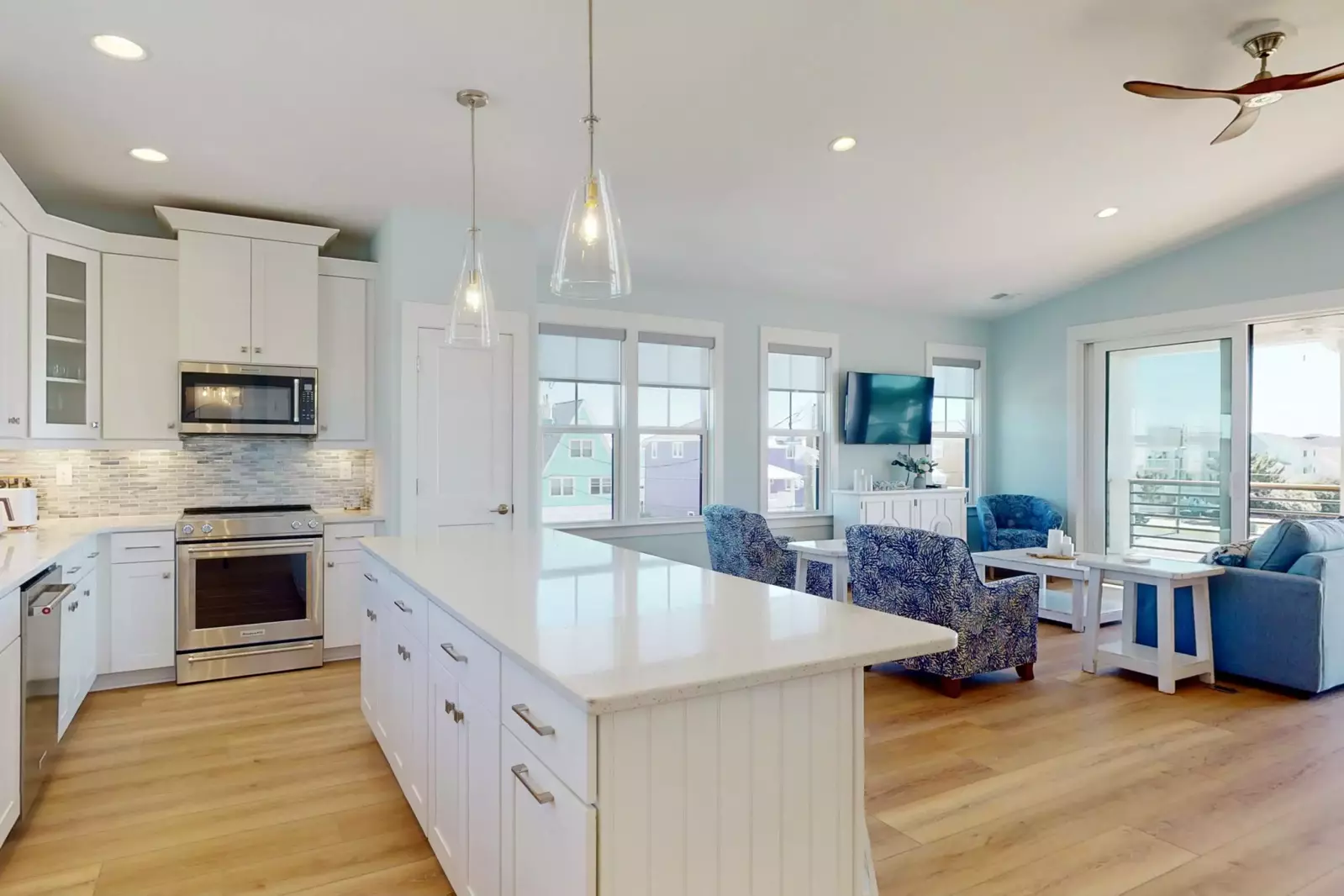 Sip your morning coffee and discuss beach plans for the day at the large kitchen island