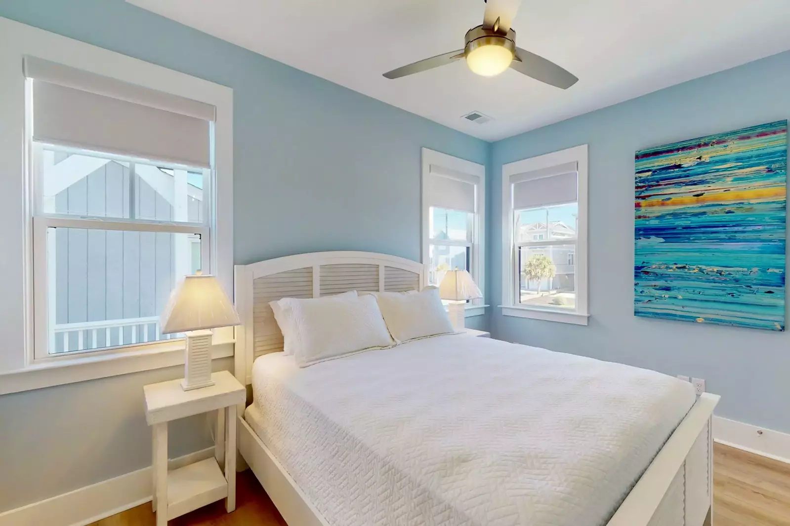 2nd floor bedroom with a queen bed