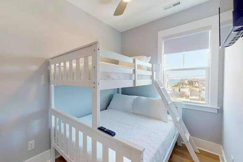 The bunk bed room with a smart TV is perfect for the kids to wind down at night