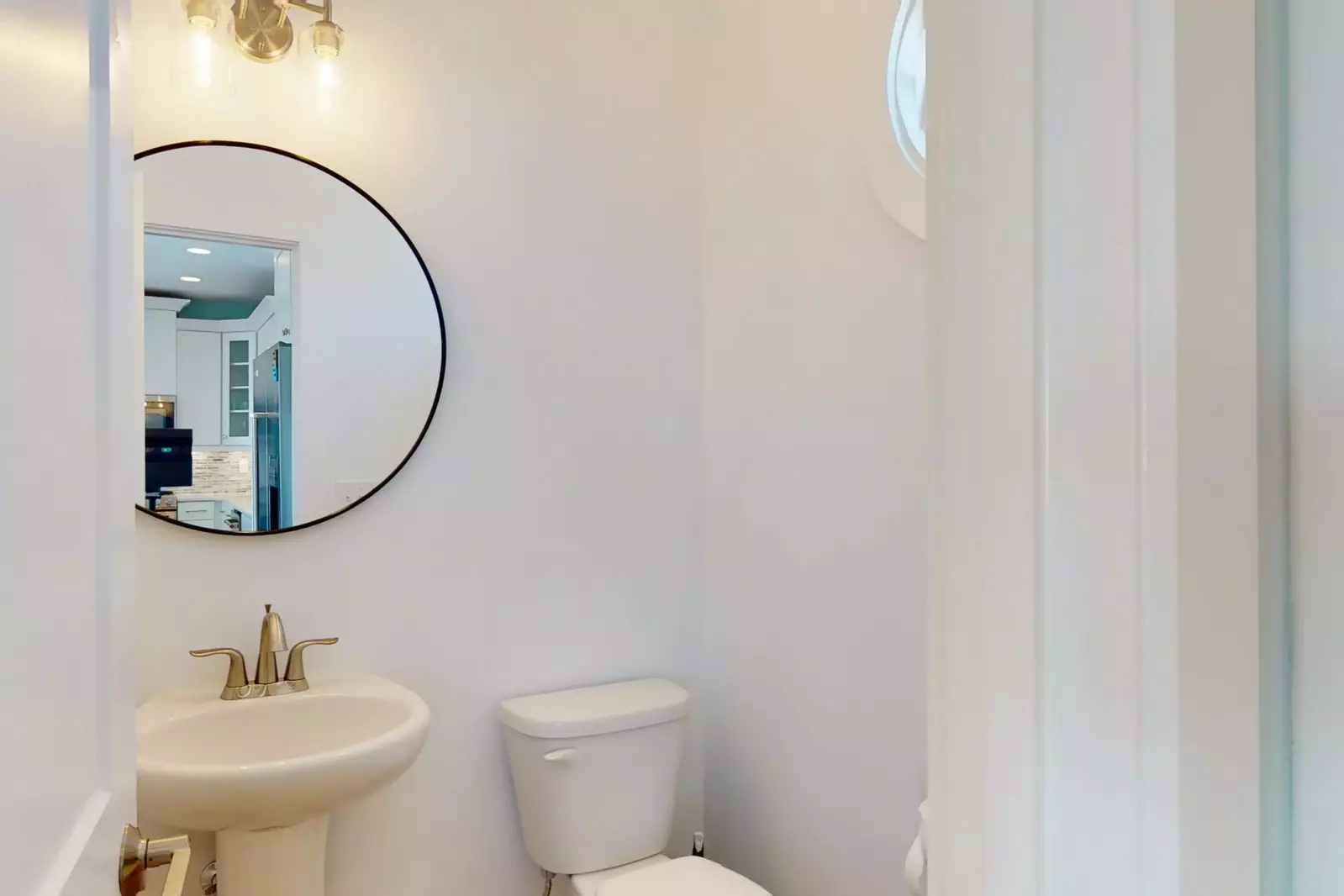 The half bath on the 3rd floor