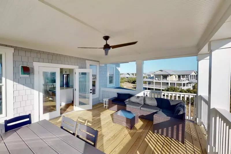 There is plenty of seating on the back porch