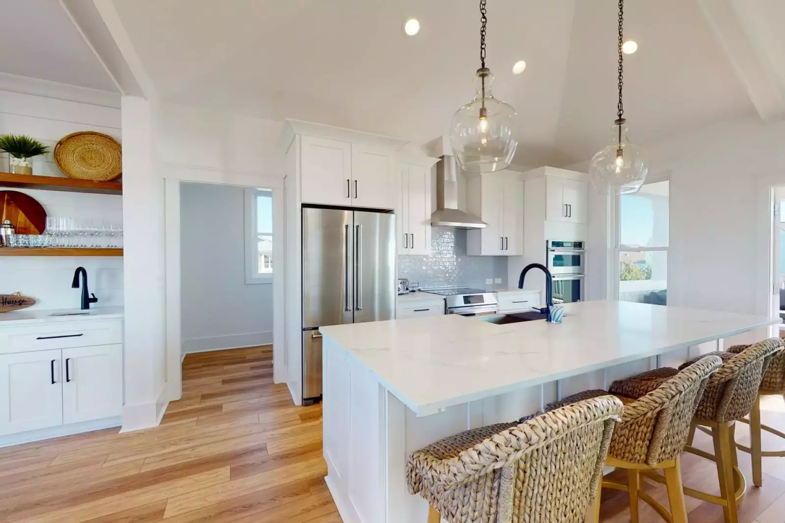 There is easy access to the pantry and half bath from the main living space