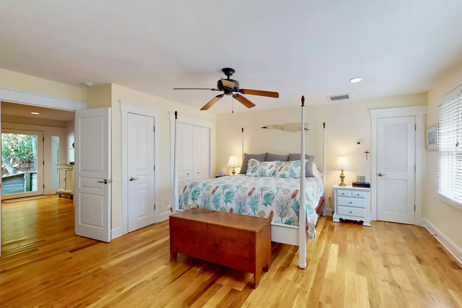 The spacious first floor owner suite has a nice king bed