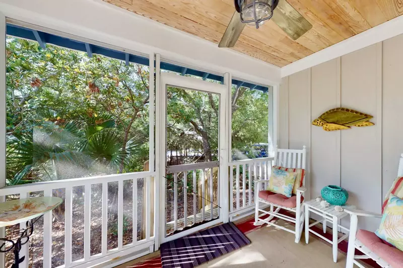 The owner suite has a private screened in porch, great for reading a good book