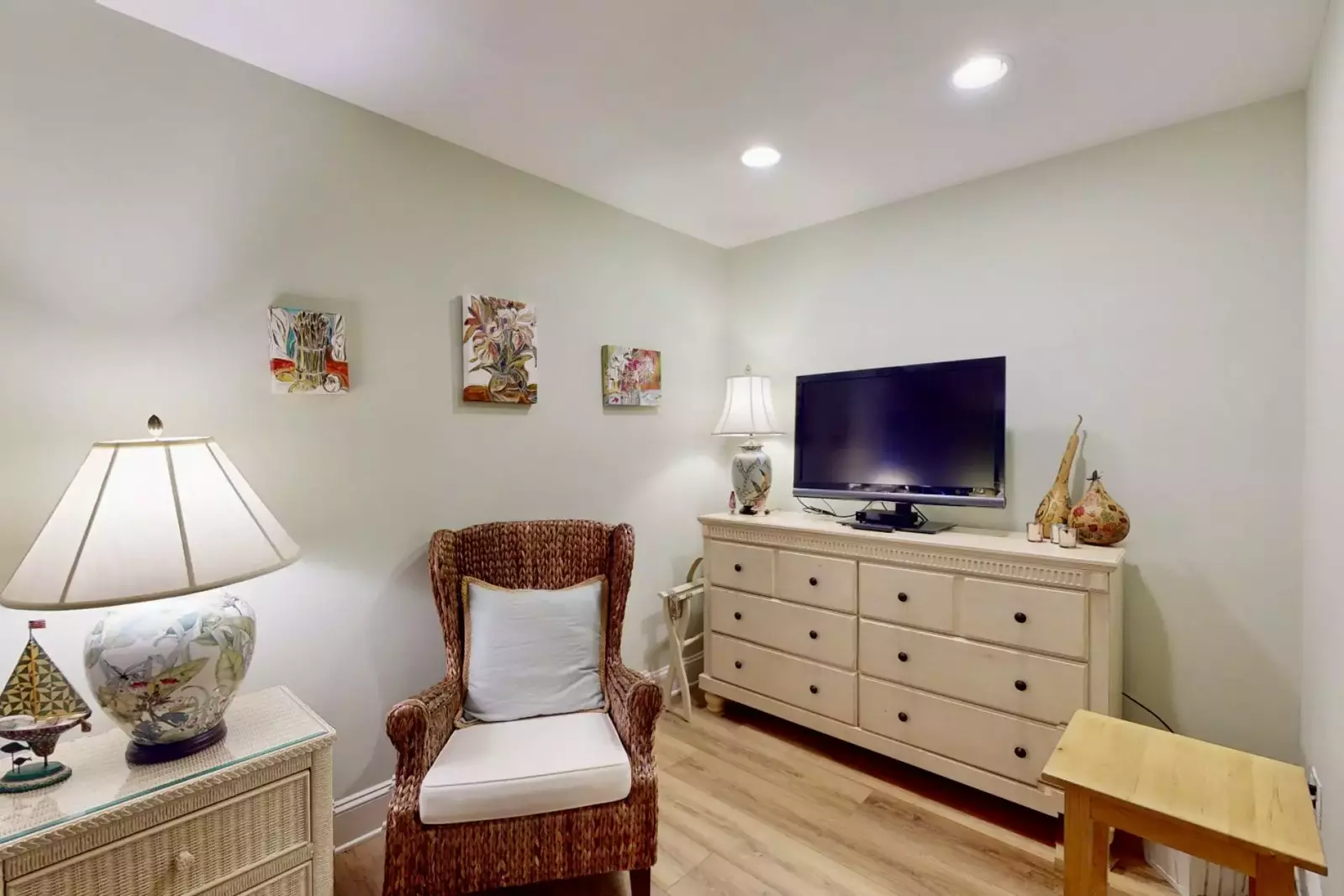 There is a comfortable sitting room in this bedroom