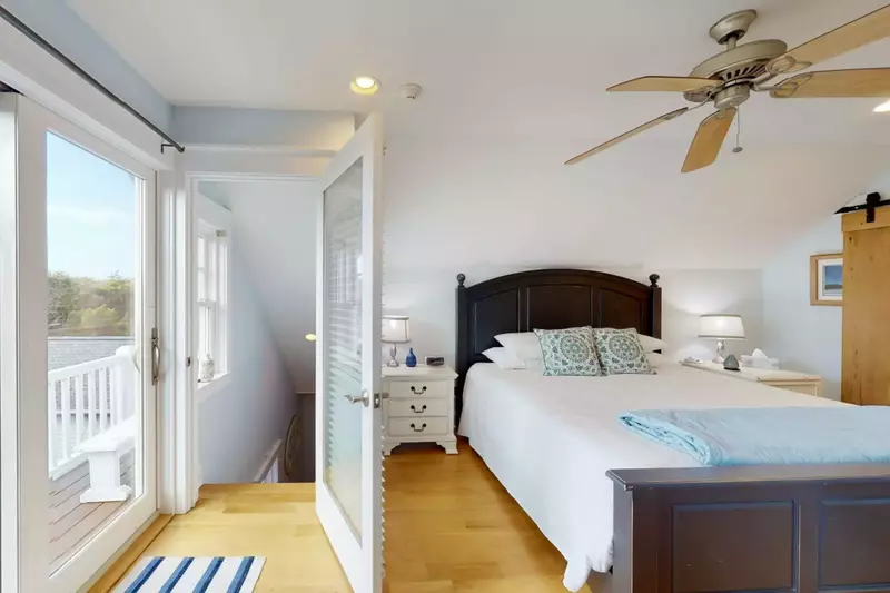 The top floor bedroom has a nice deck with great views