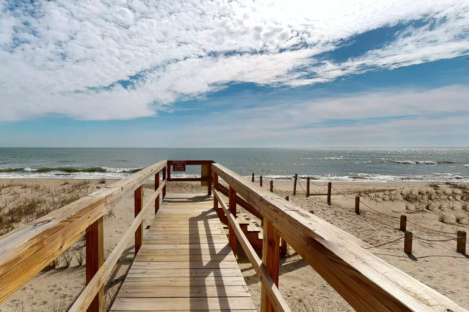 The beach access is steps away!