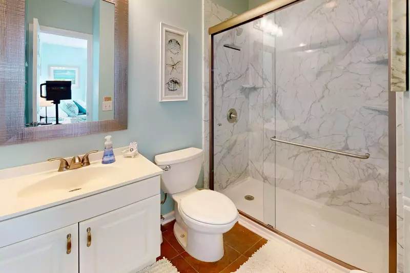 Enjoy a walk in shower in the primary ensuite