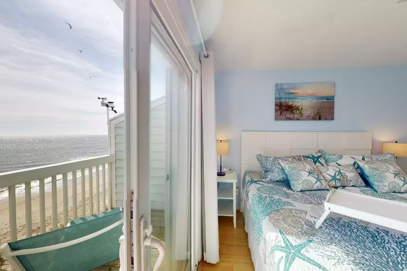 The master has it's own sliding doors to the large deck