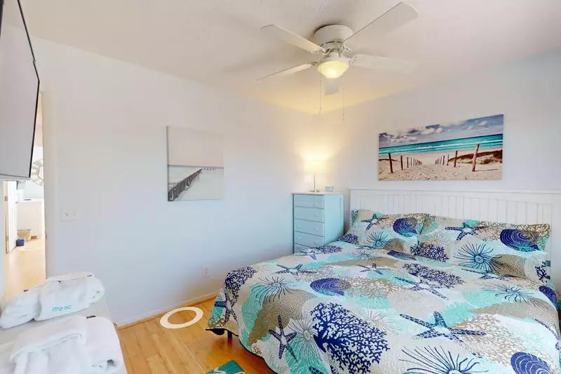 Second bedroom features a king bed and flat screen tv