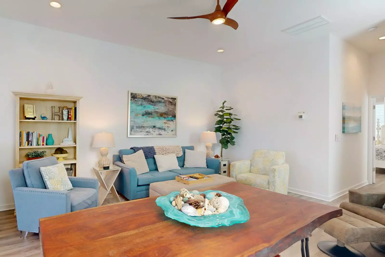 A custom wood dining table completes this elegant look