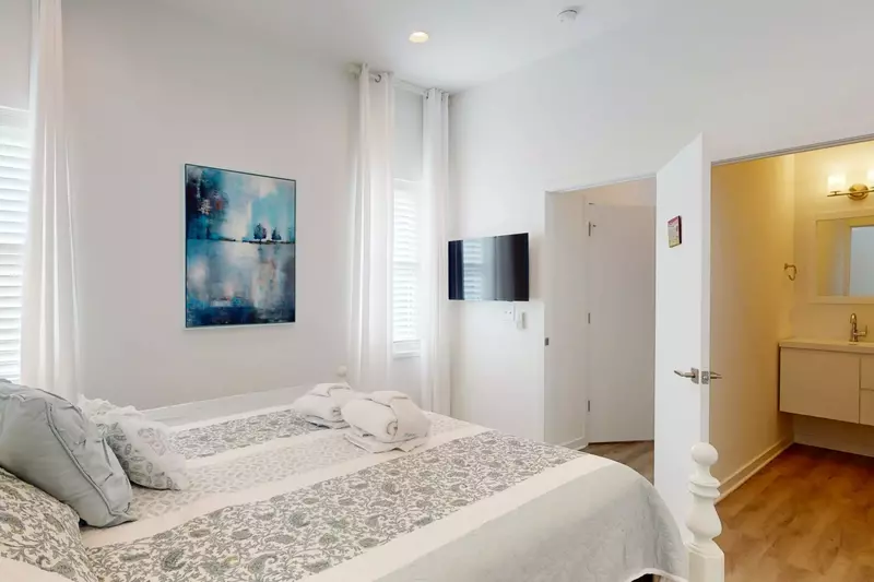 A wall mounted tv let's you wind down in your suite