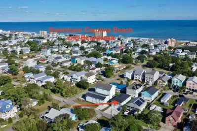 Bikinis and Martinis is close to downtown Carolina Beach and two beach access points