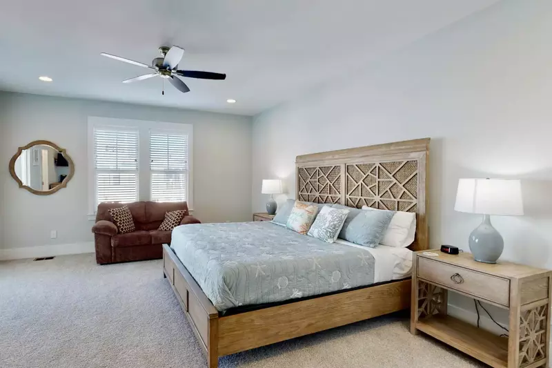 The second floor main owner suite has its own deck and a lot of space!