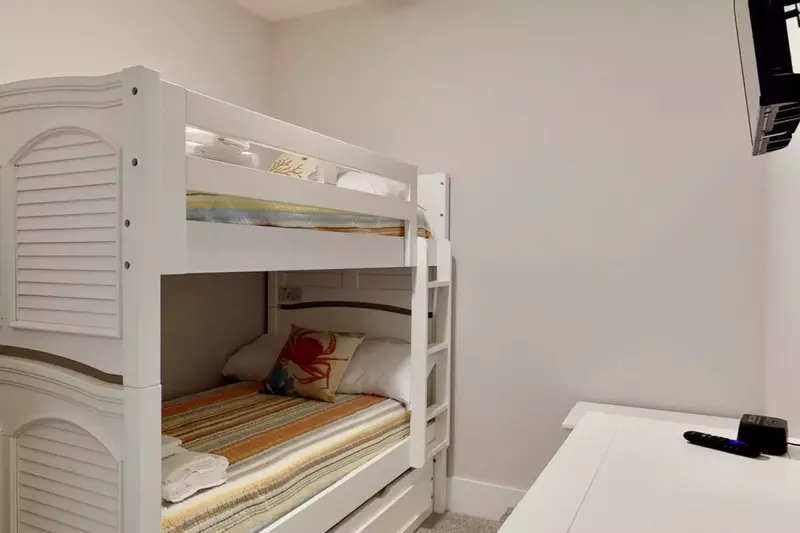 The bunk room has 2 nice twin beds with a trundle twin