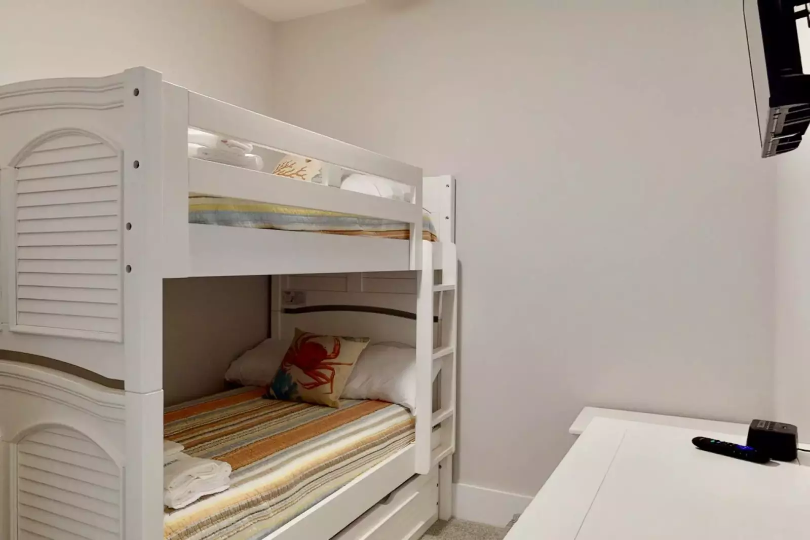 The bunk room has 2 nice twin beds with a trundle twin