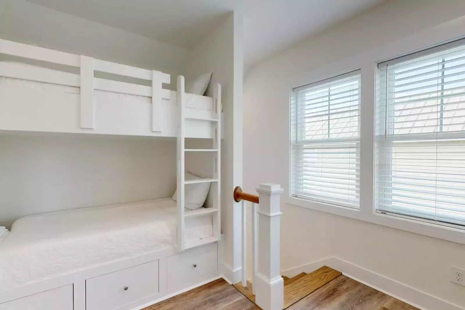 Custom built in bunk beds in the hallway. Fun for the kids!