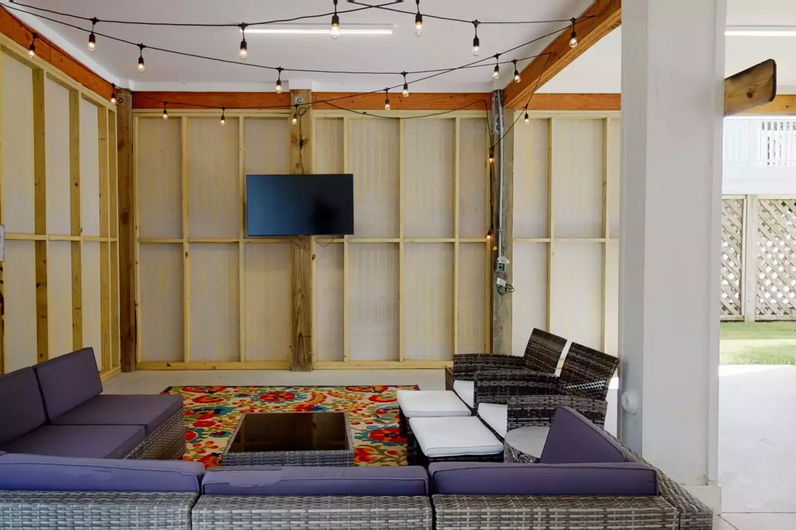 Have a fun movie night in the outdoor living space while the kids play in the backyard