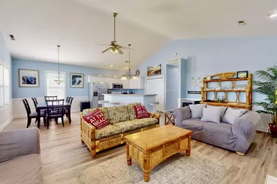 The open floor plan allows space for the entire family