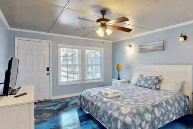 1st Floor owner suite with king bed and full bathroom