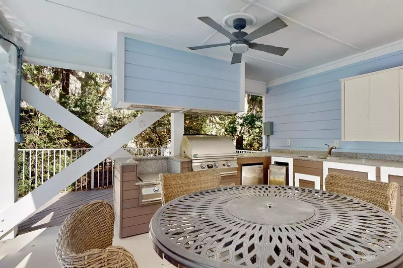 Enjoy a meal outside next to the pool