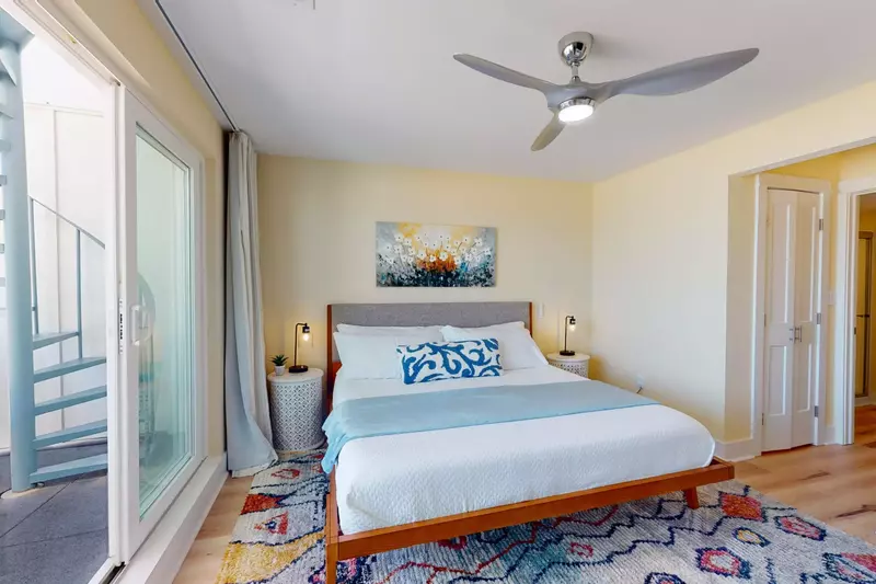 The king size bed and ocean views will have you never wanting to leave Top Deck!