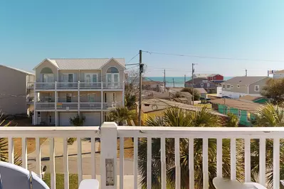 Soak in the sights and sounds of the ocean from the third floor deck