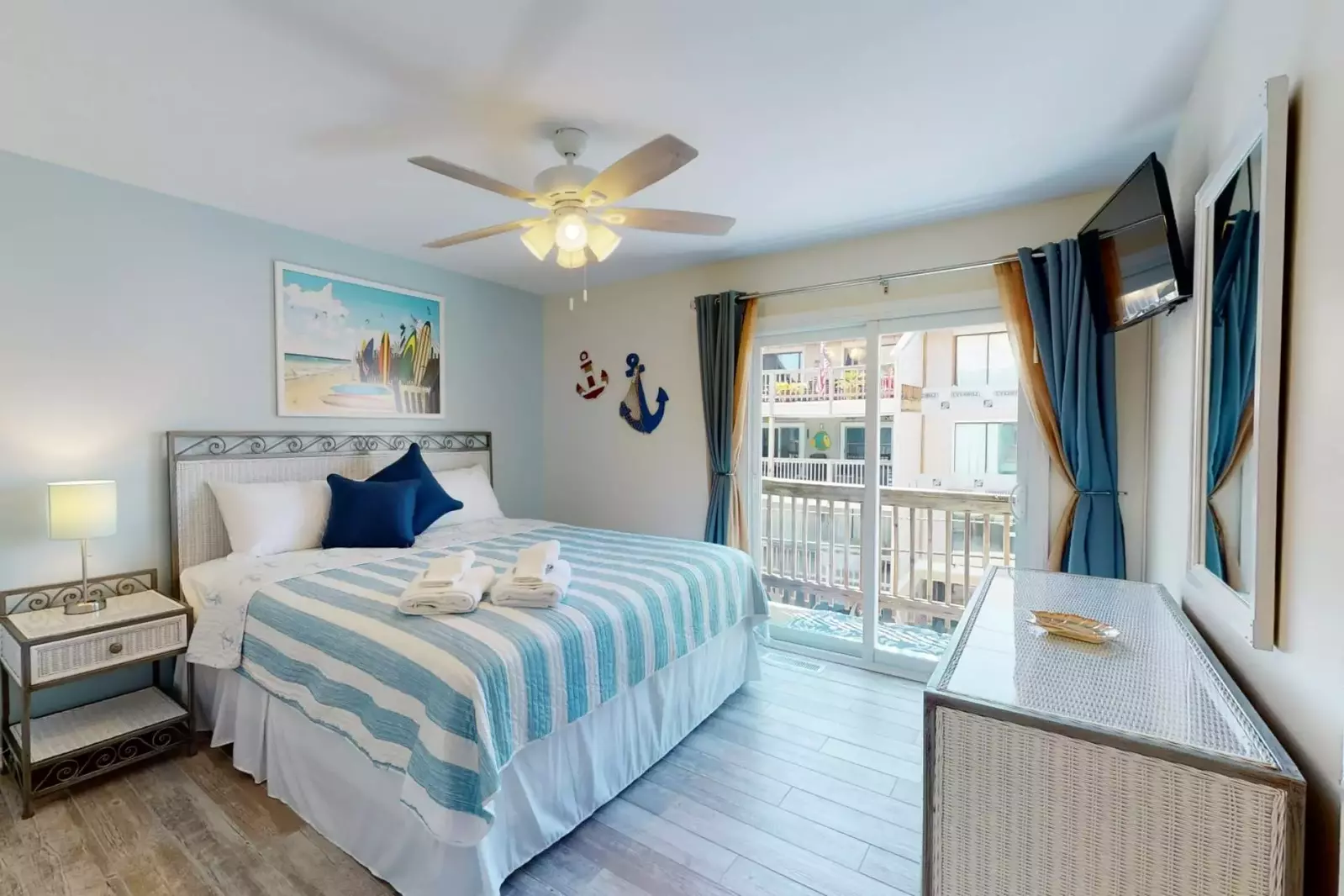 Second bedroom with sliding glass doors to a back baclony