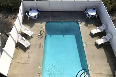 Enjoy the community pool after a long day at the beach at Winds V!