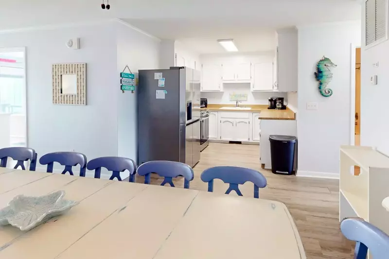 The dining area opens into the kitchen making it easy to cook and serve